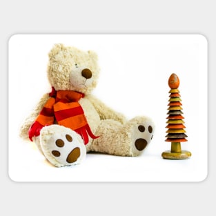 Fluffy teddy bear with red scarf and wooden ring stacker Sticker